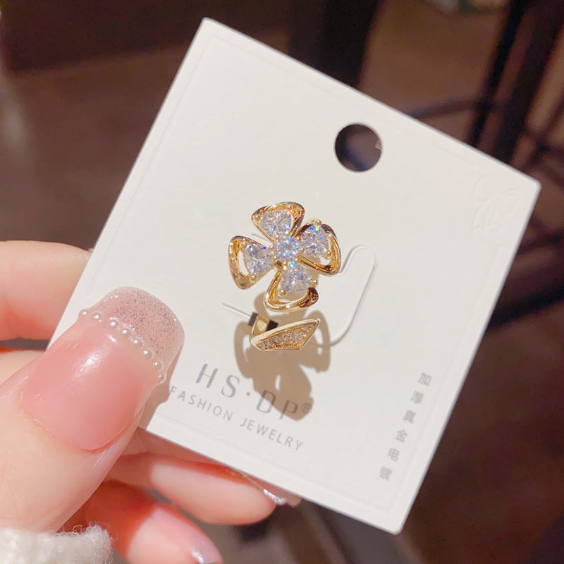 Micro Inlaid Zircon Rotatable Four-Leaf Flower Ring Cn0308