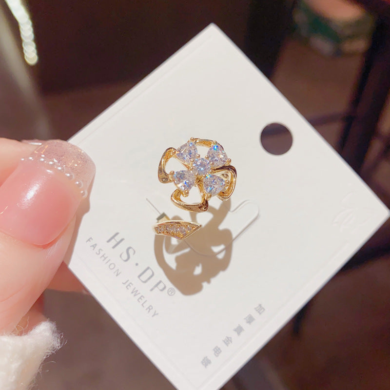 Micro Inlaid Zircon Rotatable Four-Leaf Flower Ring Cn0308