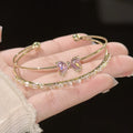 Bracciale farfalla rosa Cn377