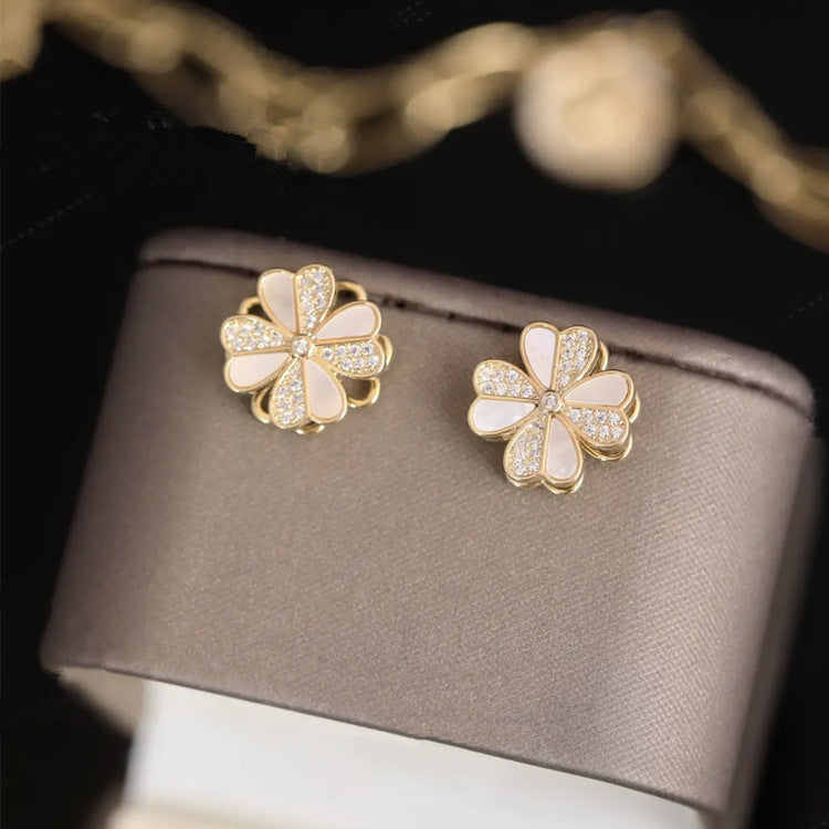 Rotating Four-Leaf Flower Shell Earrings Cn0100