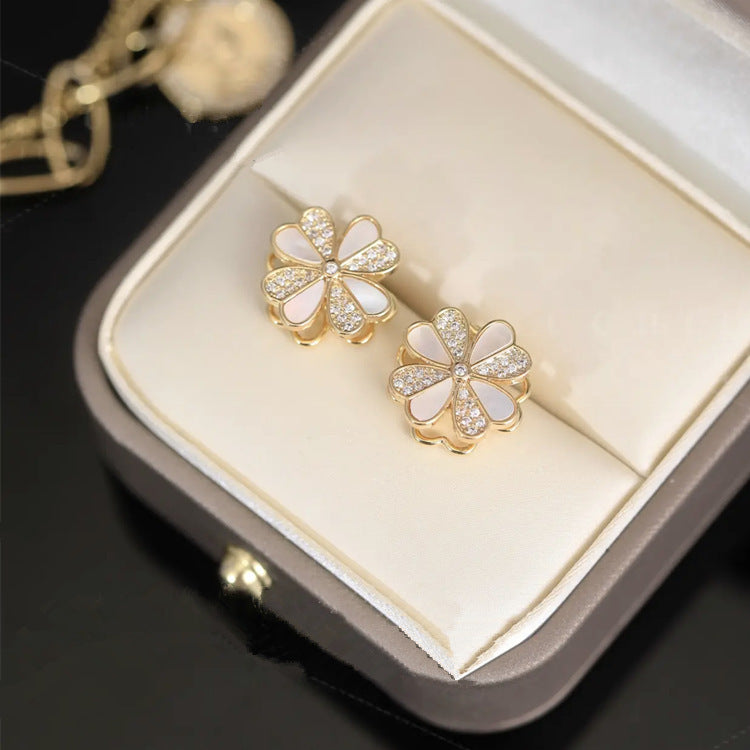 Rotating Four-Leaf Flower Shell Earrings Cn0100