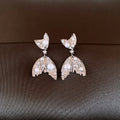 Silver Needle Zircon Pearl Fishtail Earrings Cn528