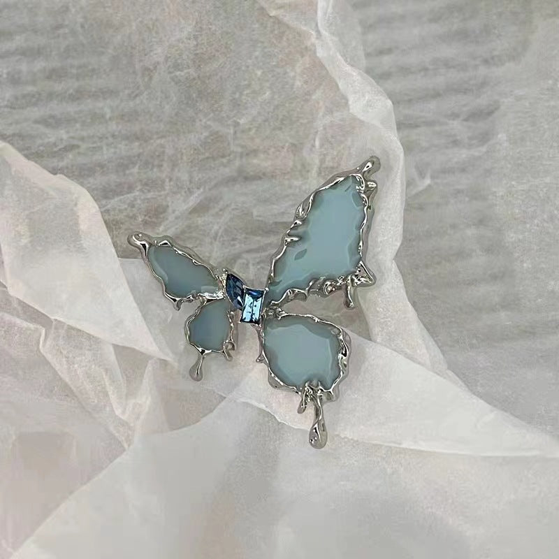 ड्रिप घुटा हुआ असममित छोटे तितली कान की बाली Cn333