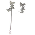 Two wearing asymmetric butterfly tassel  earrings