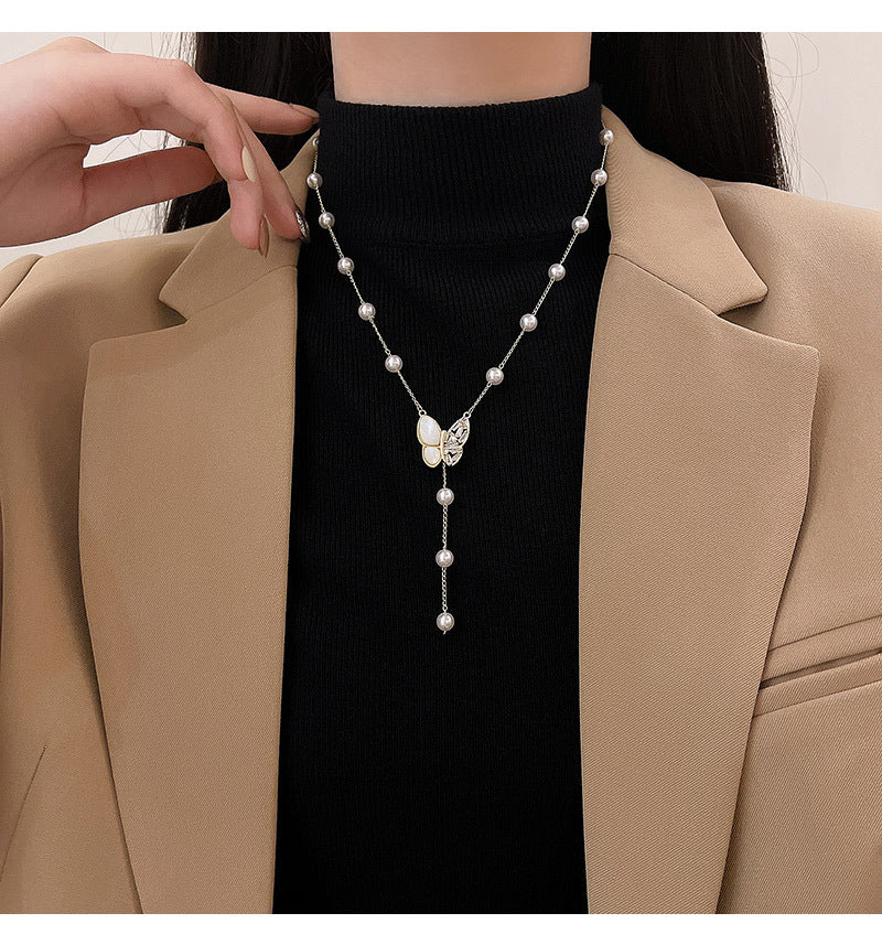 Long fringed butterfly imitation pearl necklace
