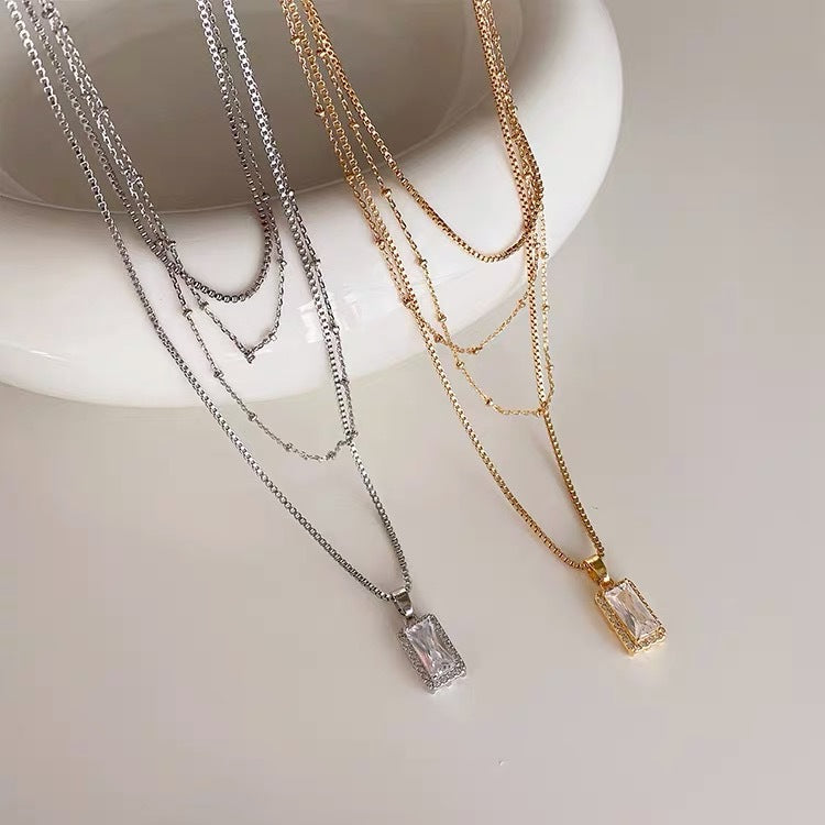 Laminierte Halskette mit quadratischer Bohrung und doppelter Schlüsselbeinkette