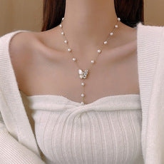 Long fringed butterfly imitation pearl necklace
