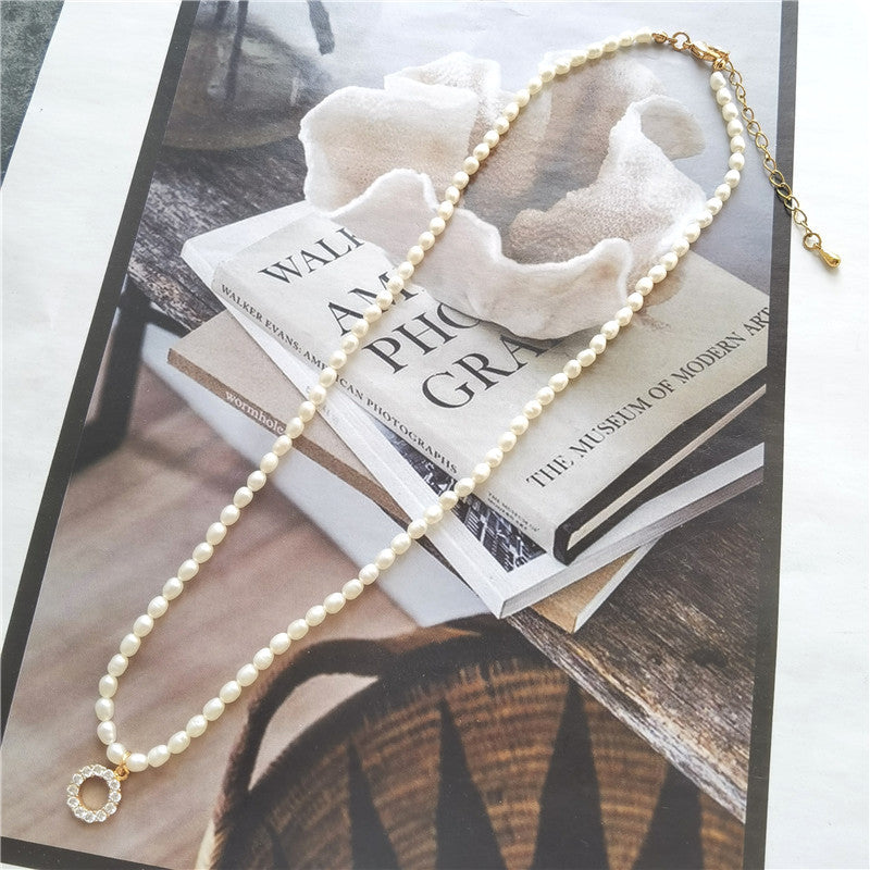 گوشواره دایره کوچک زیرکون گردنبند آب شیرین