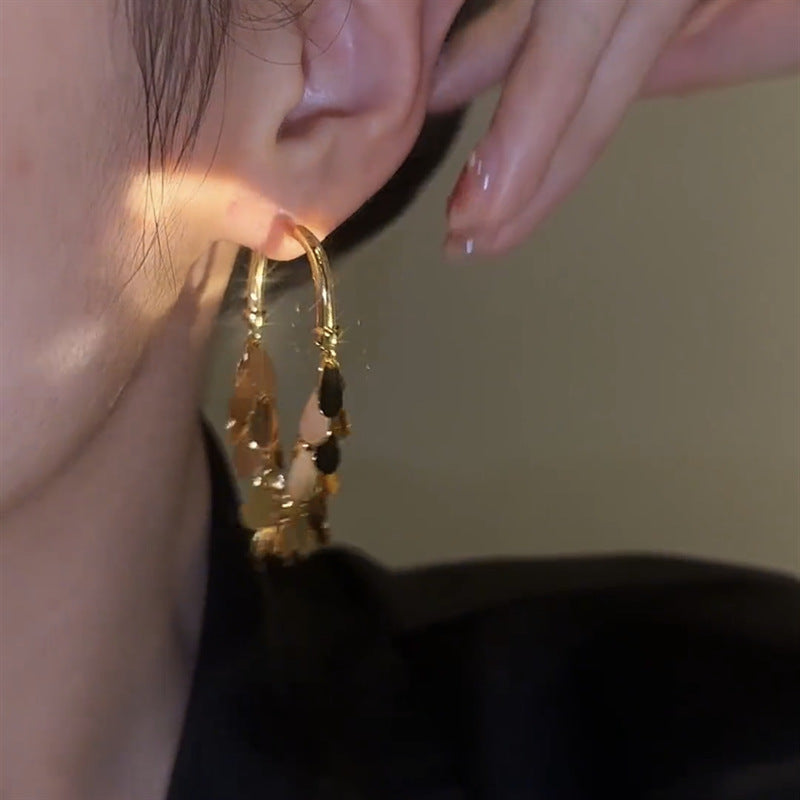 گوشواره منگوله ای پولک دار فلزی