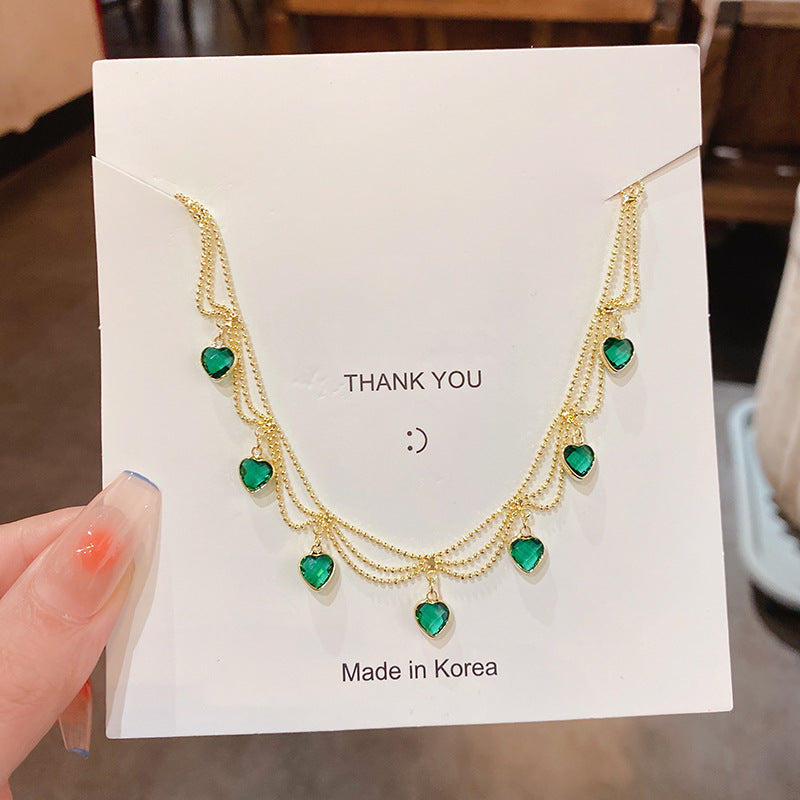 Electroplated emerald zircon love necklace