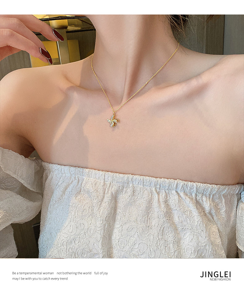 Kalung kincir angin yang dapat diputar untuk wanita musim panas mewah ceruk rantai klavikula 2021 perasaan desain baru aksesoris kalung merah bersih