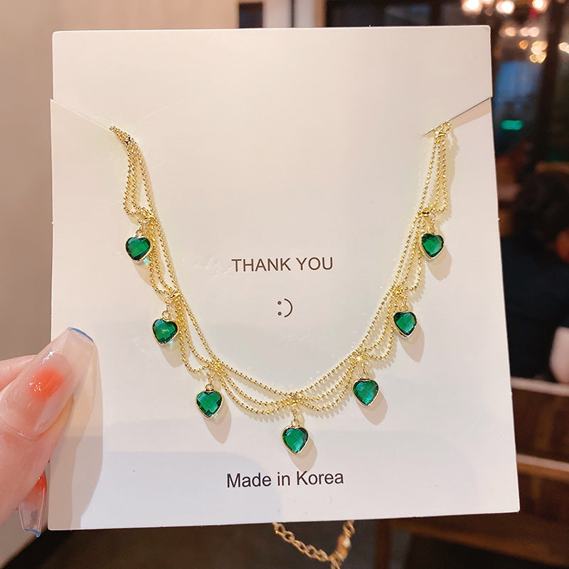 इलेक्ट्रोप्लेटेड पन्ना जिक्रोन लव नेकलेस