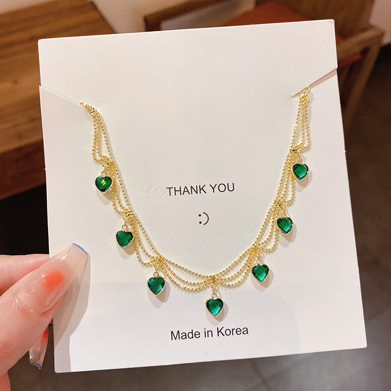 इलेक्ट्रोप्लेटेड पन्ना जिक्रोन लव नेकलेस