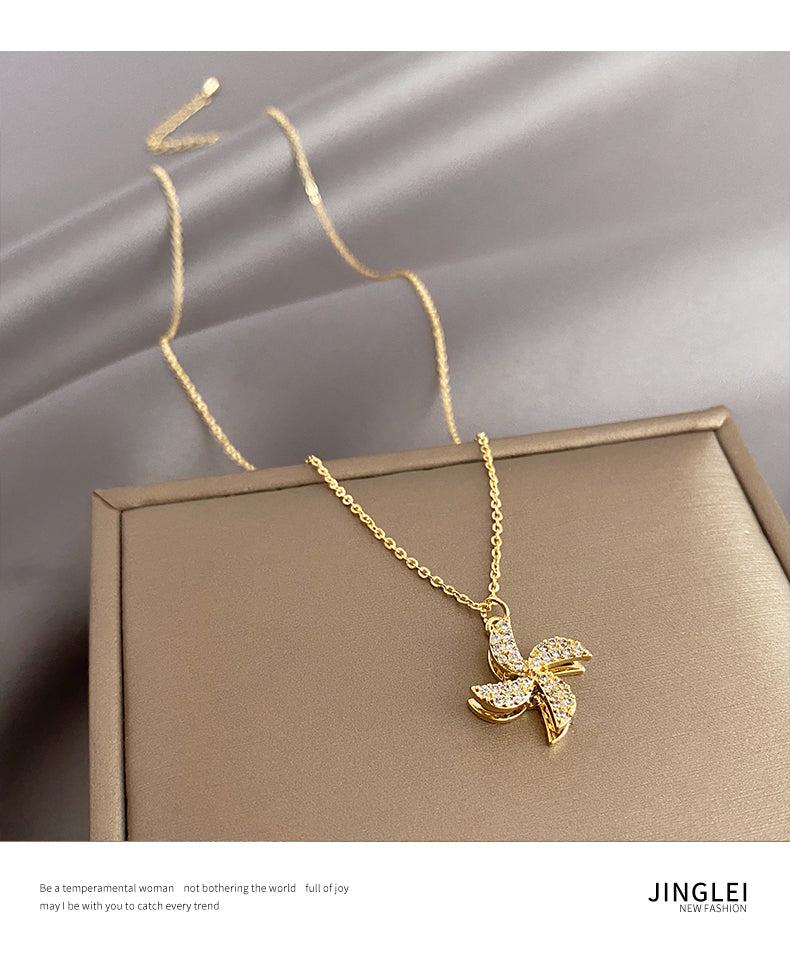 Kalung kincir angin yang dapat diputar untuk wanita musim panas mewah ceruk rantai klavikula 2021 perasaan desain baru aksesoris kalung merah bersih
