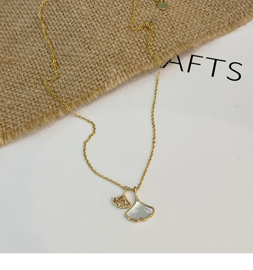 خوبانی کی پتی سفید رال مائکرو زرقون ڈبل ہار