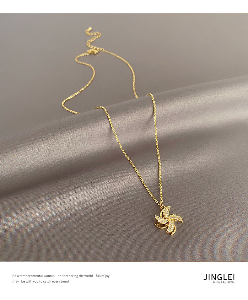 Kalung kincir angin yang dapat diputar untuk wanita musim panas mewah ceruk rantai klavikula 2021 perasaan desain baru aksesoris kalung merah bersih