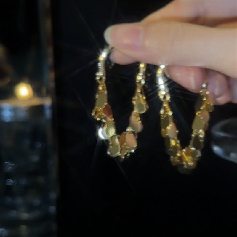 گوشواره منگوله ای پولک دار فلزی