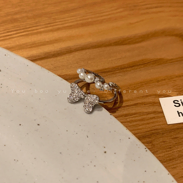 Cincin ganda busur zirkon bertatahkan mikro