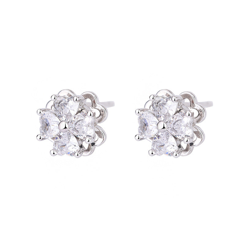 Sterling silver four-leaf clover revolving zircon earrings