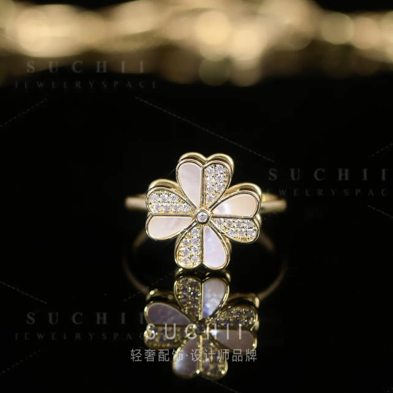 Rotatable four-leaf clover shell color matching ring