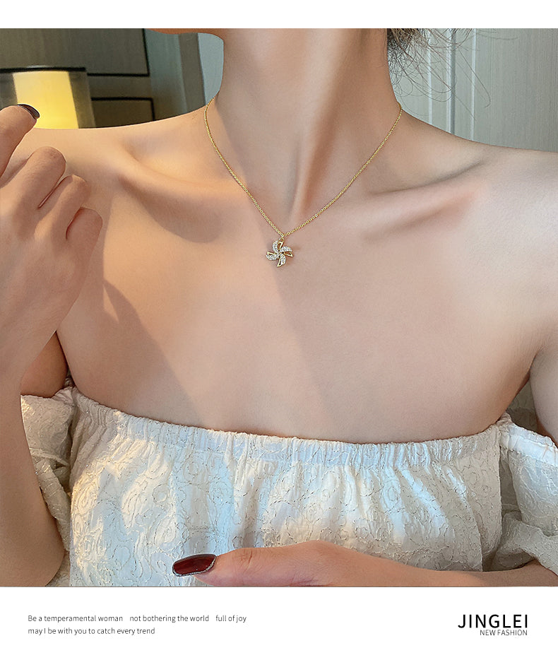 Kalung kincir angin yang dapat diputar untuk wanita musim panas mewah ceruk rantai klavikula 2021 perasaan desain baru aksesoris kalung merah bersih