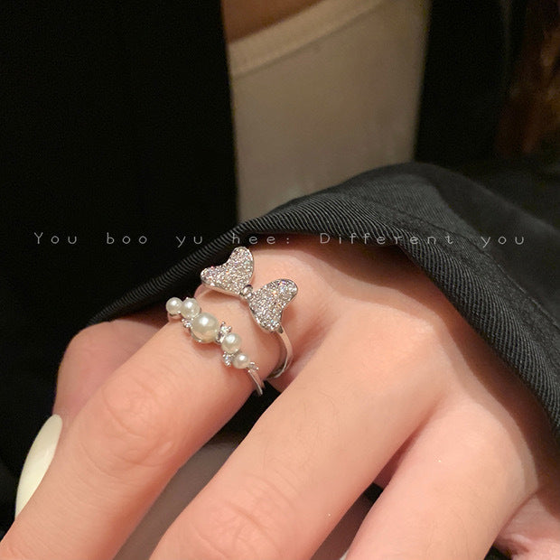 Nhẫn đôi nơ zircon khảm siêu nhỏ