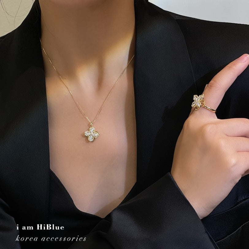 Bông tai vòng cổ cỏ bốn lá xoay