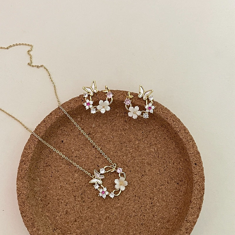 گوشواره گردنبند بدلیجات گل پروانه صدفی