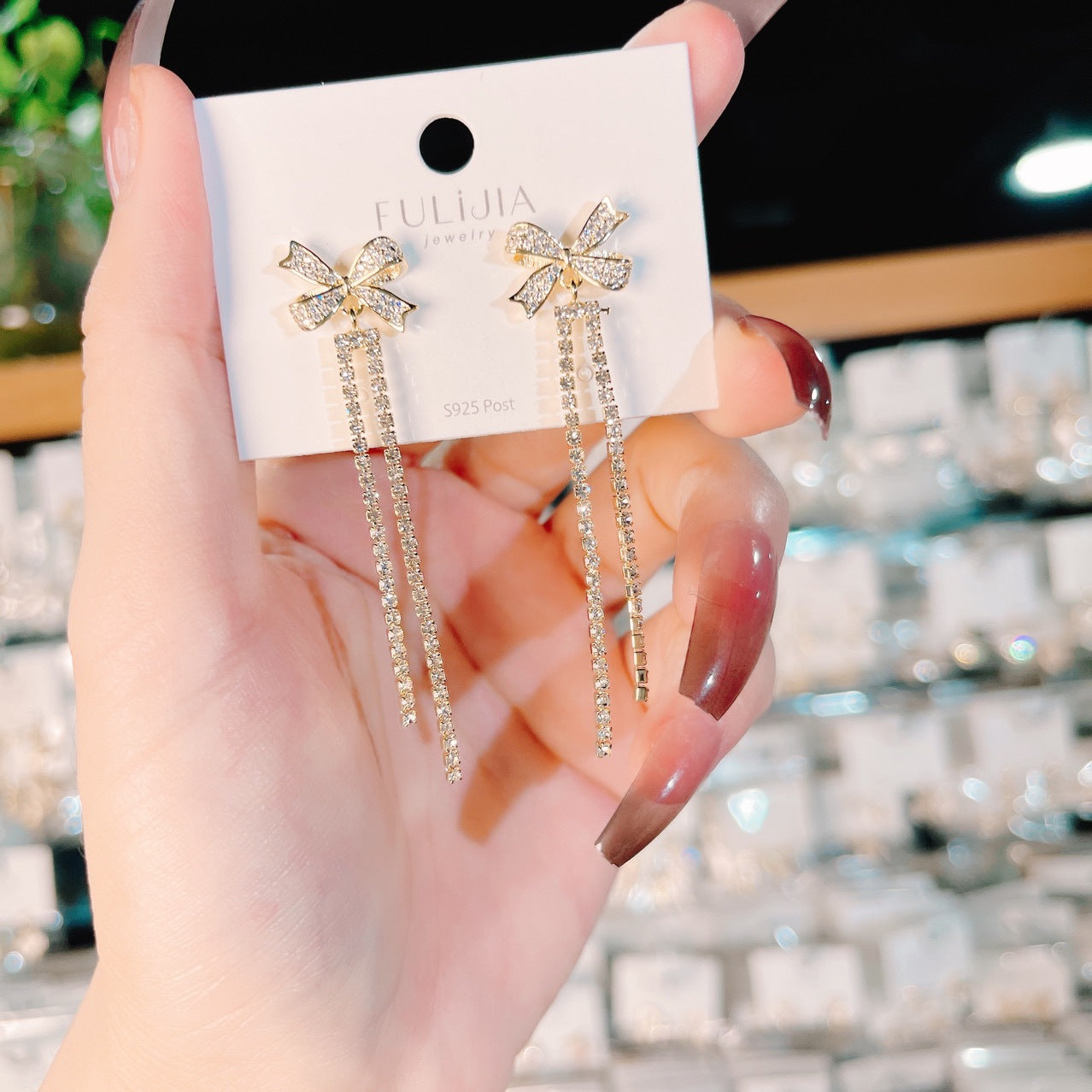 Zircon Inlaid Bowknot Crystal Tassel Earrings