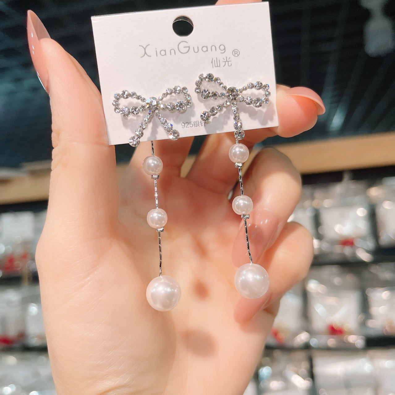 گوشواره های میخ دار منگوله دار پاپیون الماس محبوب مد