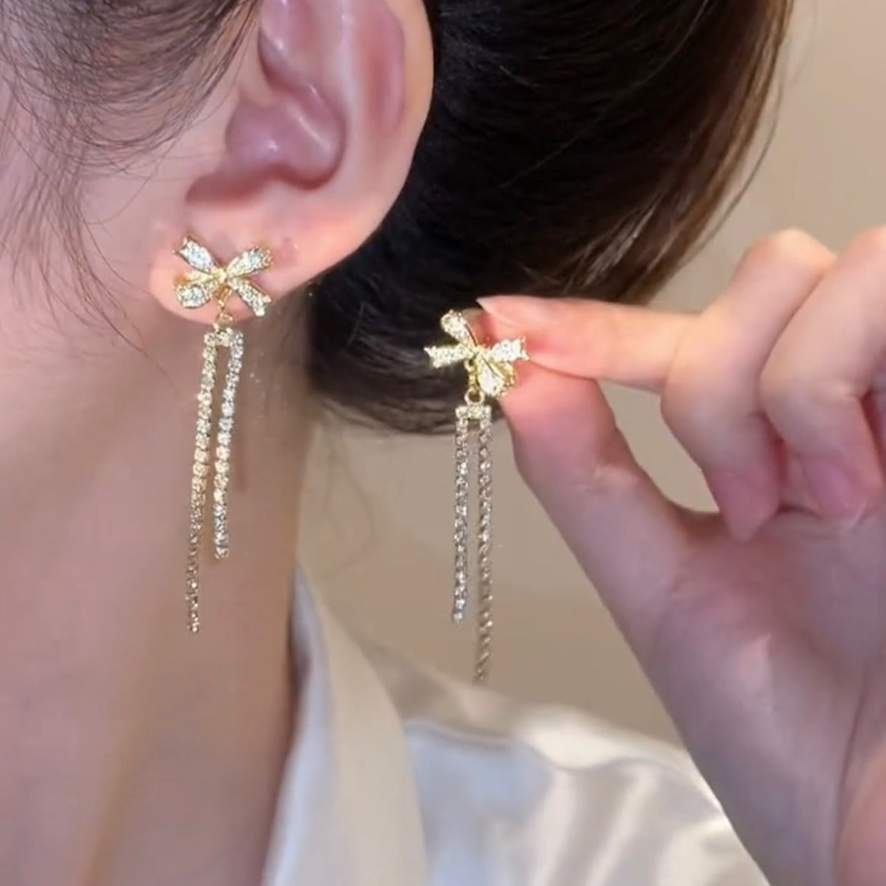 Zircon Inlaid Bowknot Crystal Tassel Earrings