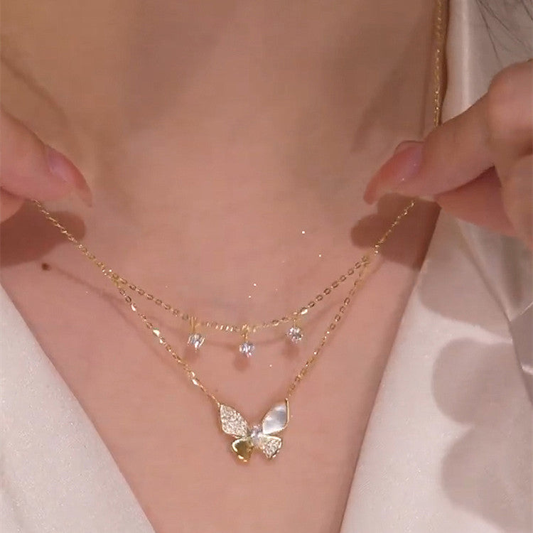Moda semplice conchiglia d'oro micro intarsiato ciondolo farfalla piccolo diamante collana da donna catena clavicola