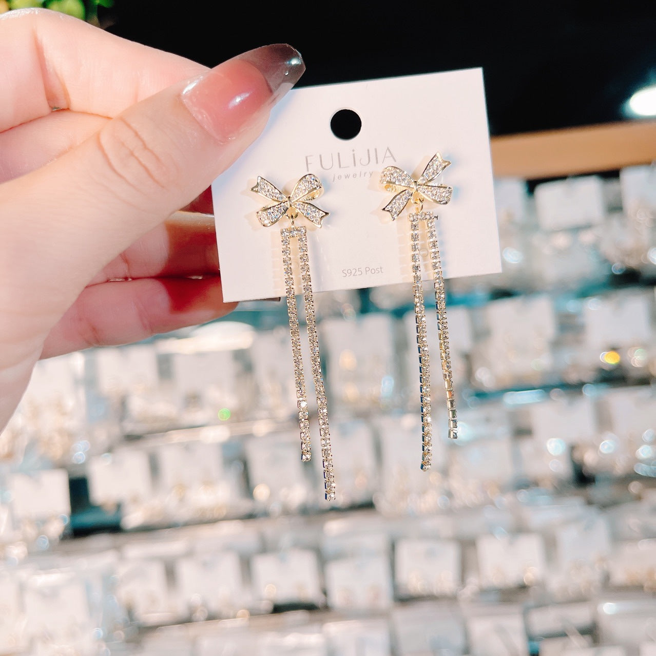 Zircon Inlaid Bowknot Crystal Tassel Earrings