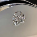 Zircon with Diamond Heart-Shaped Open Ring Cn0021