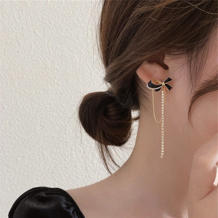 Pendientes largos con borla y cadena de diamantes de imitación con lazo