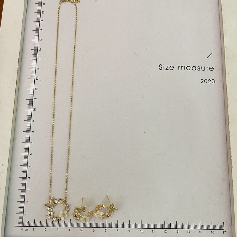 گوشواره گردنبند بدلیجات گل پروانه صدفی