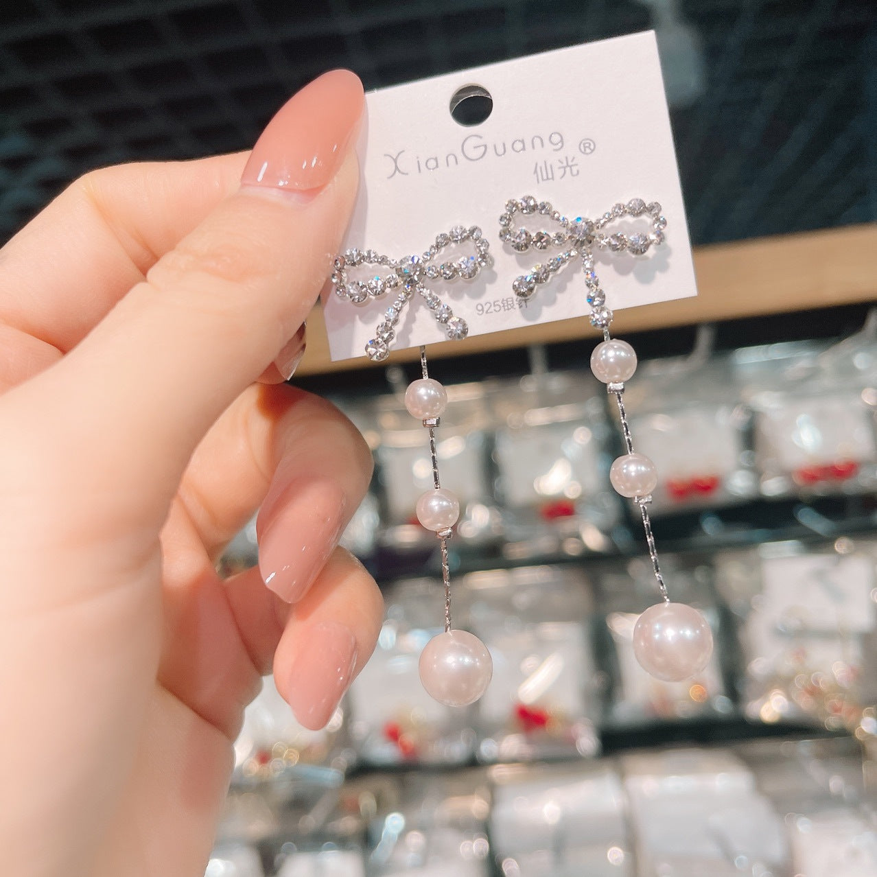 گوشواره های میخ دار منگوله دار پاپیون الماس محبوب مد