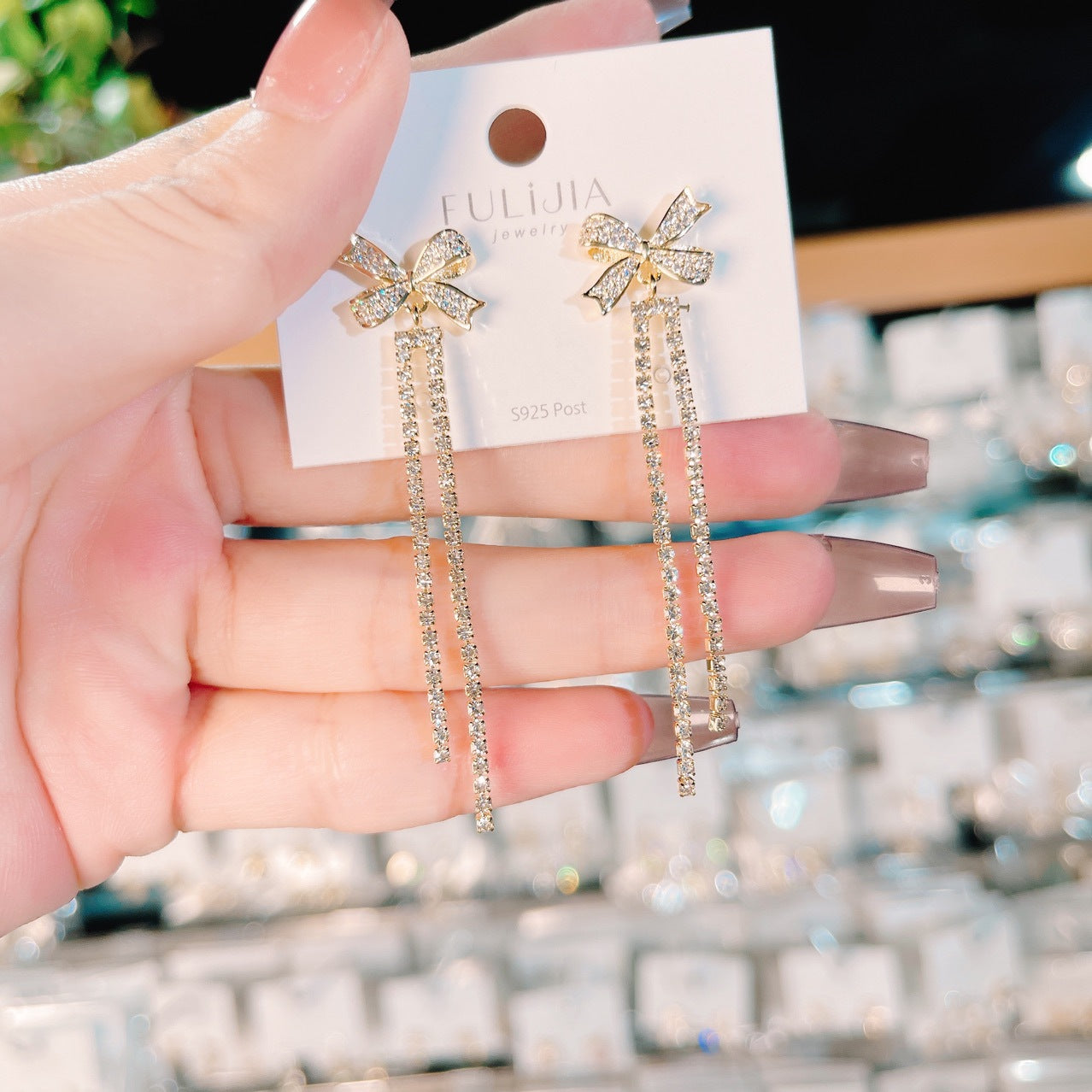 Zircon Inlaid Bowknot Crystal Tassel Earrings