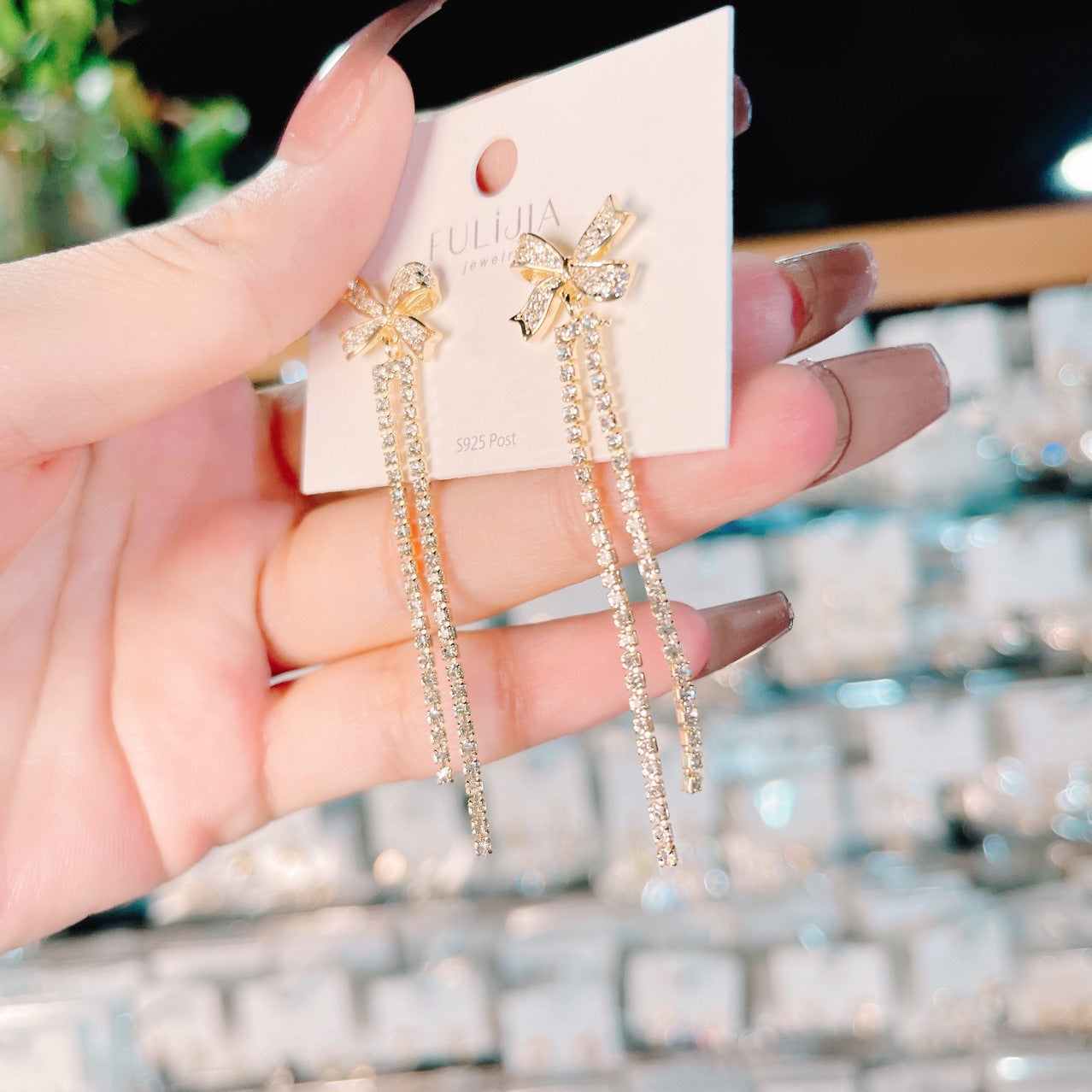 Zircon Inlaid Bowknot Crystal Tassel Earrings