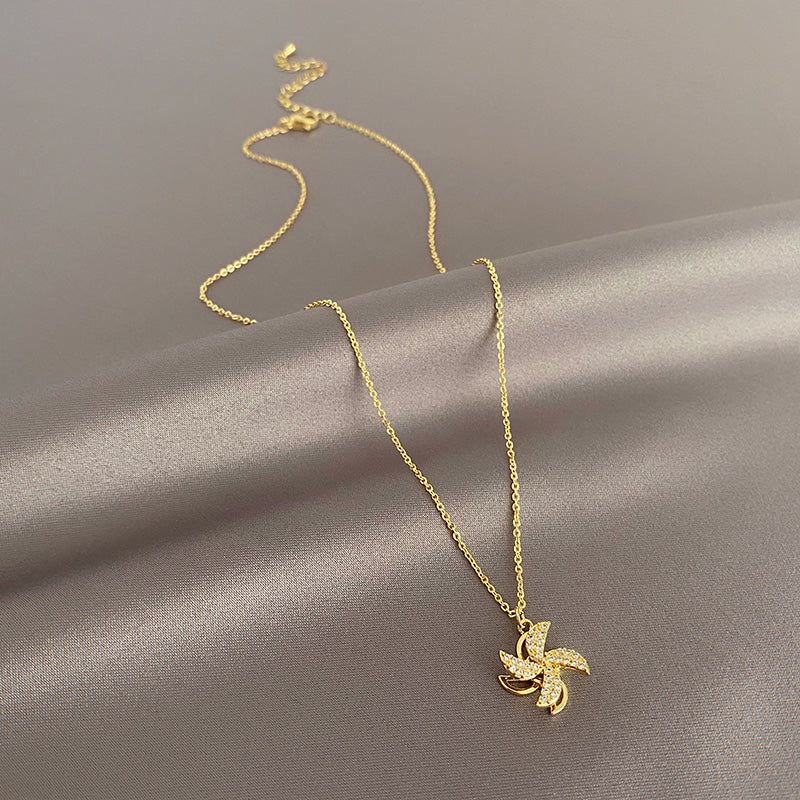 Kalung kincir angin yang dapat diputar untuk wanita musim panas mewah ceruk rantai klavikula 2021 perasaan desain baru aksesoris kalung merah bersih