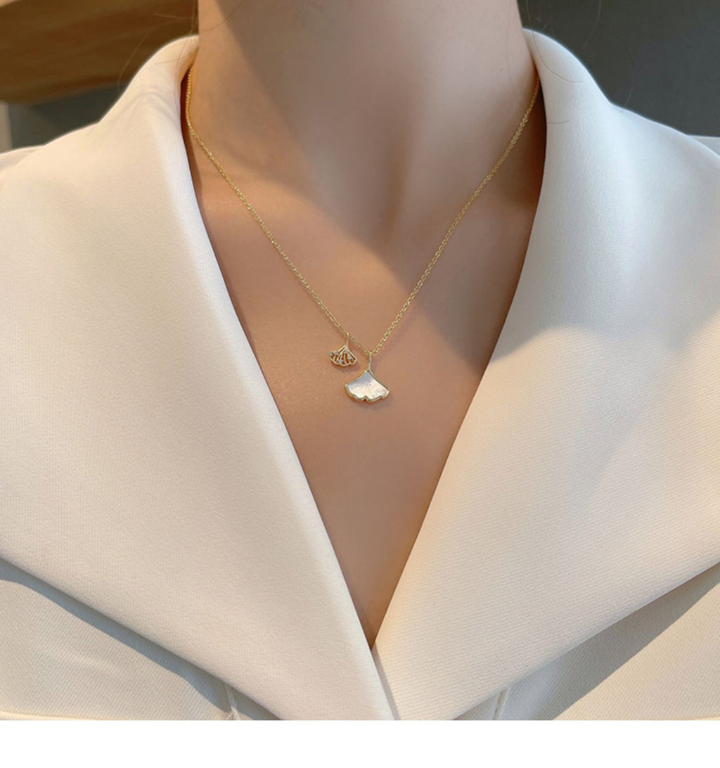 خوبانی کی پتی سفید رال مائکرو زرقون ڈبل ہار