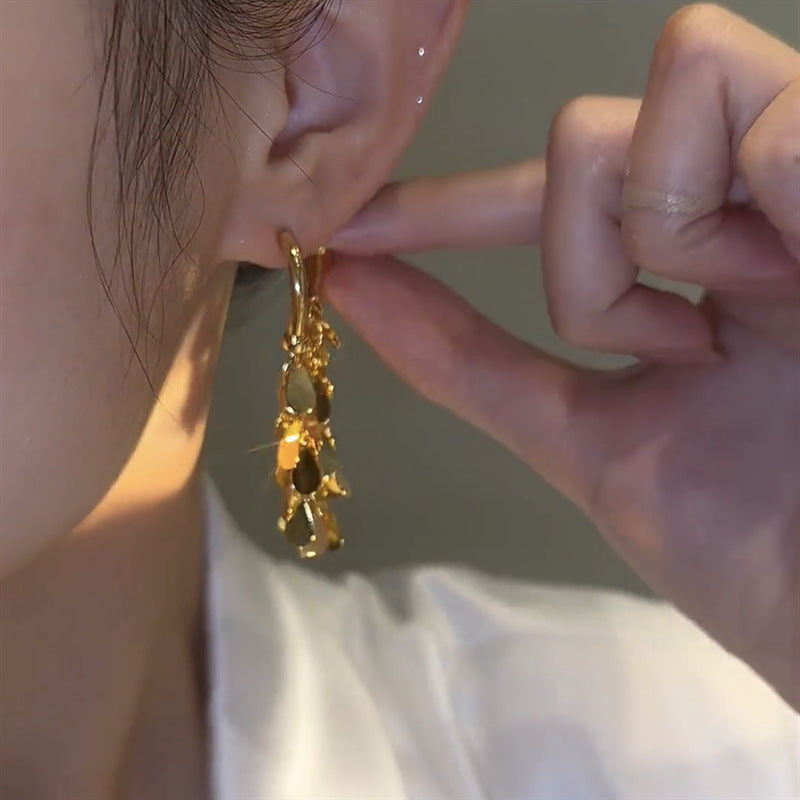 گوشواره منگوله ای پولک دار فلزی