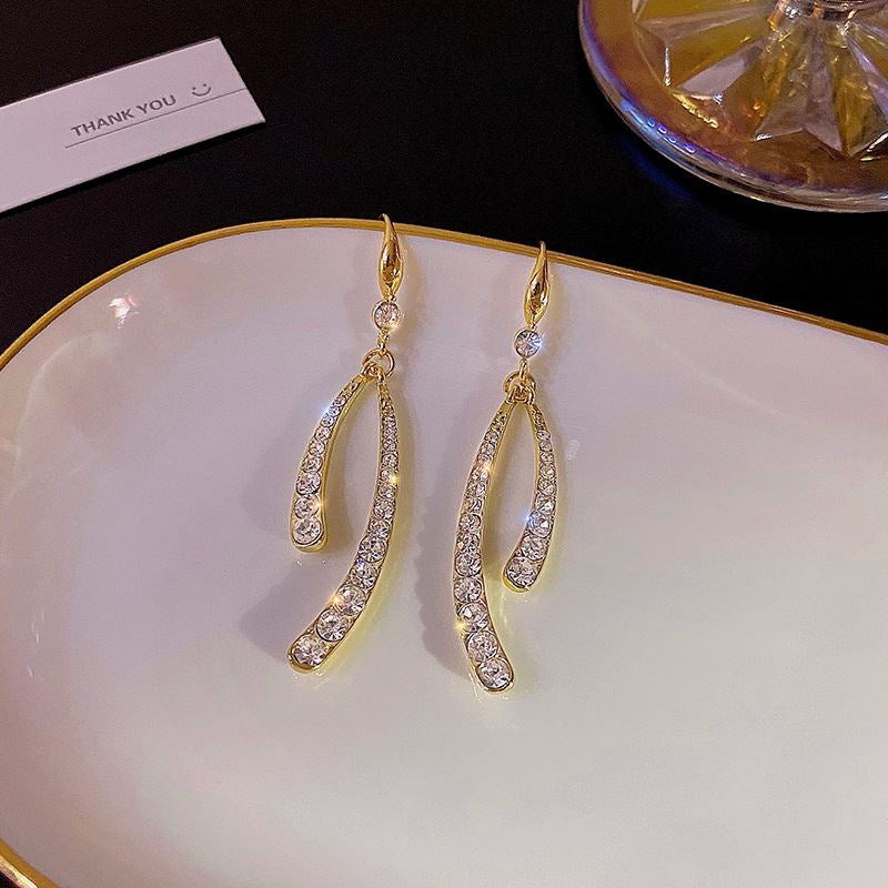 طرح کوچک گوشواره دم ماهی