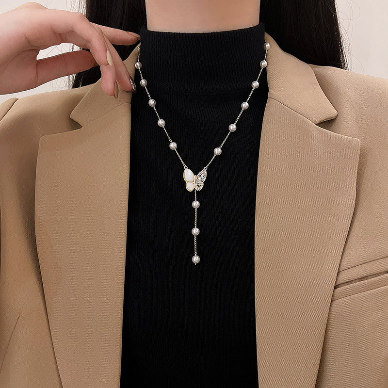 Long fringed butterfly imitation pearl necklace