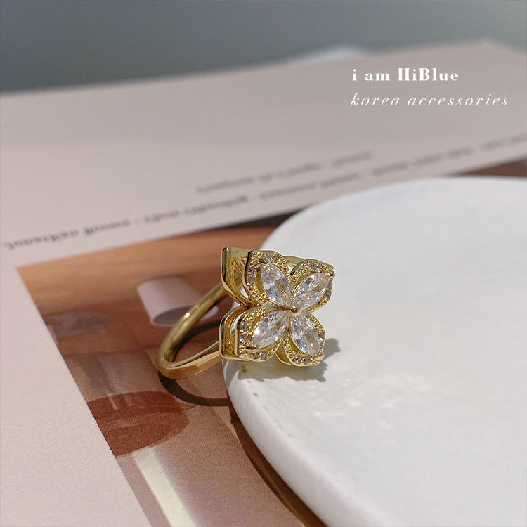 Vòng cỏ bốn lá có thể xoay được khảm siêu nhỏ zircon