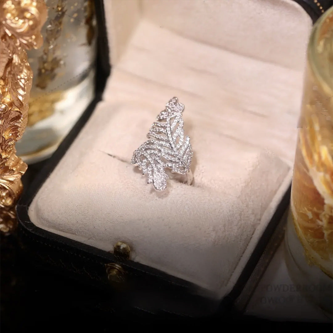 Nhẫn lông vũ lớn sáng bóng hơi khảm zircon