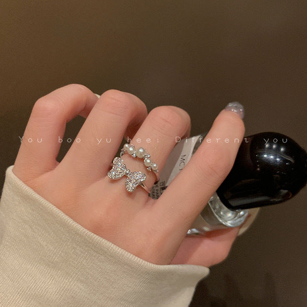 Nhẫn đôi nơ zircon khảm siêu nhỏ