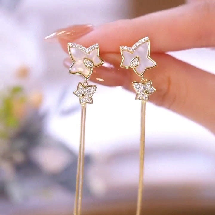 Micro-inlaid zircon five-pointed star tassel earrings